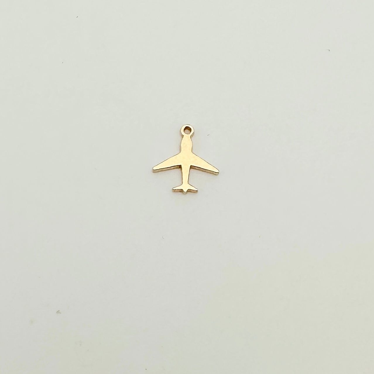 gold filled airplane connector, gold filled connectors, permanent jewelry connectors, essbe jewelry supply, permanent jewelry supplier, airplane charm, airplane connector, sterling silver airplane charm